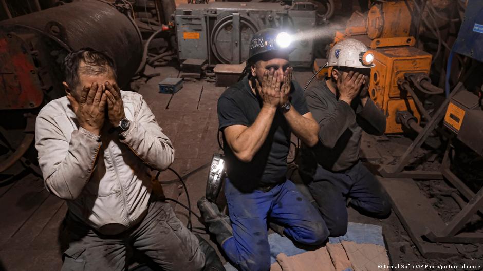 Bosnian coal miners pray after breaking fast in the underground at a mine in Zenica, Bosnia, 29 April 2021 (photo: AP Photo/Kemal Softic)