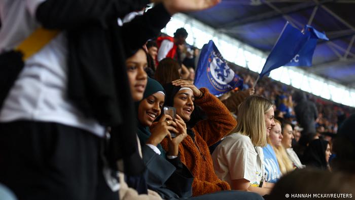 Sisterhood FC team members at a football match