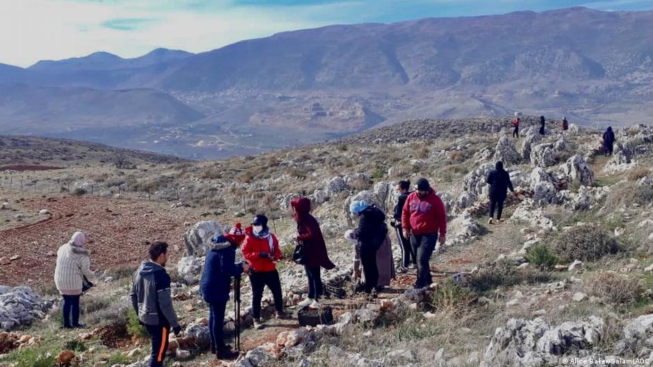 Female refugees working to reforest the land in Lebanon (image: SALAM LADC)