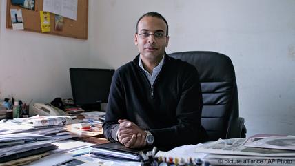 Director of the human rights organisation Egyptian Initiative for Personal Rights, Hossam Bahgat Director of the human rights organisation Egyptian Initiative for Personal Rights, Hossam Bahgat sits behind a desk covered in papers