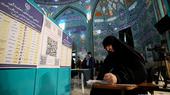 Iran began voting Friday with questions looming over just how many people will turn out for the poll