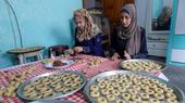 Baking Eid sweets in Gaza: cookies filled with dates, mixed nuts or a mix of honey and sesame seeds are another quintessential Eid delicacy across the Middle East. Baking the cookies, which are called kakh, is a key social activity, with many families gathering to make and decorate the cookies ahead of Eid, as here in Gaza