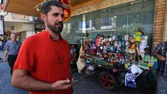 Iraqi Kurd Haresh Talib says he struggles to get paid and his children's schooling is disrupted in his conflict-riddled country.
